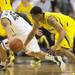 Michigan sophomore Trey Burke steals the ball from Michigan freshman Denzel Valentine during the first half at Breslin Center in East Lansing on Tuesday, Feb. 12. Melanie Maxwell I AnnArbor.com
